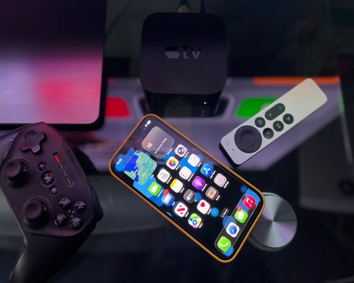 Smartphone displaying a coral-themed fictional mobile game at the exhibition