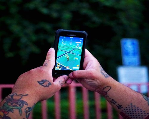 Smartphone displaying a fictional creative world composer game